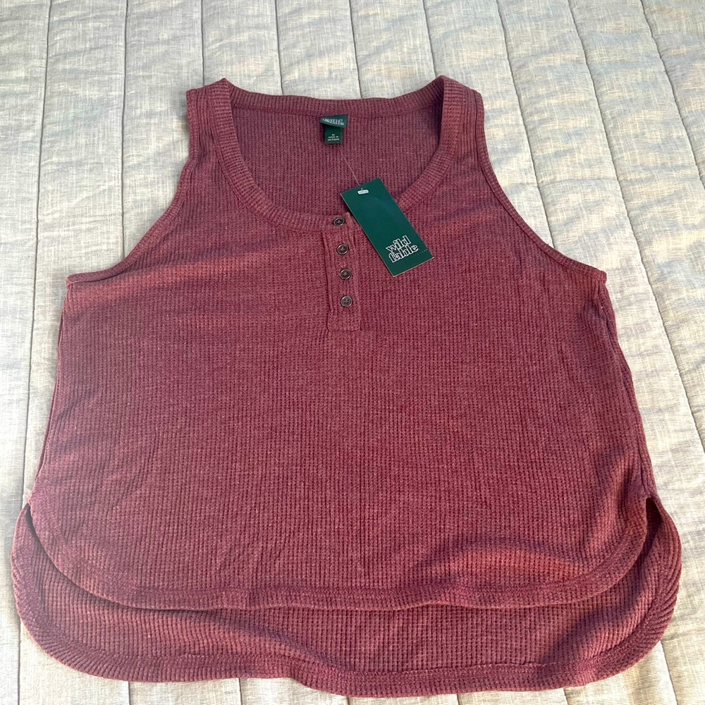 New with tags, medium tank. Smoke free home.